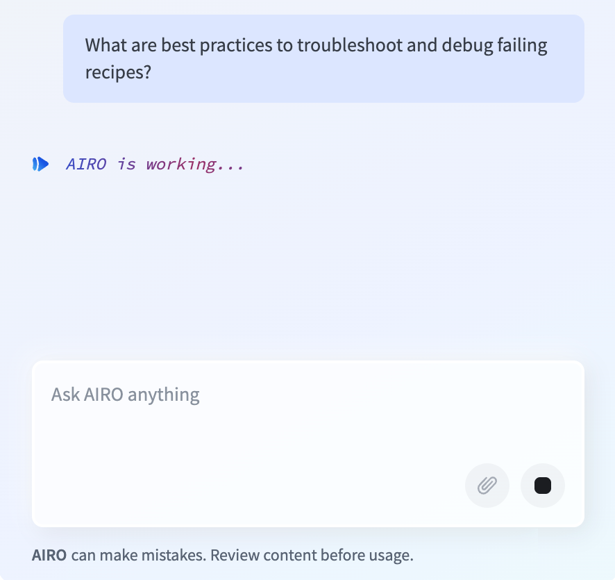 AIRO chat panel showing an "AIRO is working..." message with the stop button in place of the send button